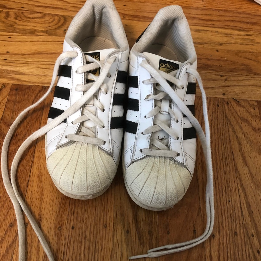 Adidas superstar shoes.